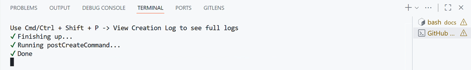 The postCreateCommand running in the terminal